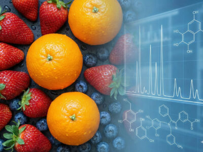 top-down shot of fresh, washed fruits (citrus and berries) with water droplets, taking up the left 2/3 of the frame. Overlaid on the right side (fading in) is a digital representation of a chromatogram graph or chemical molecular structures.