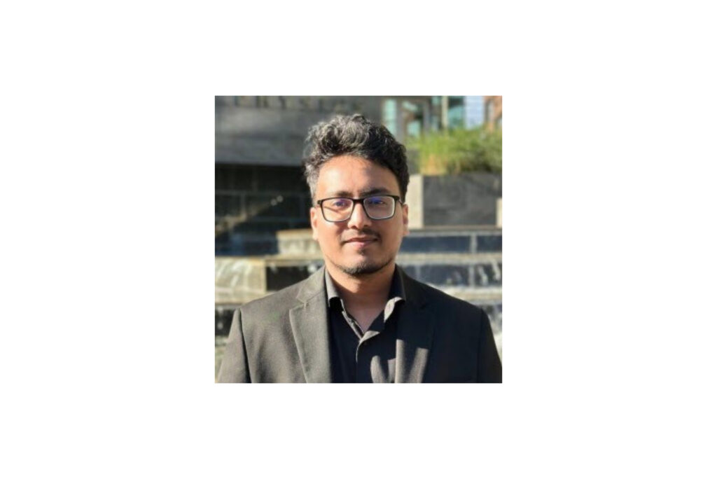 A photo portrait of Navid Alam.