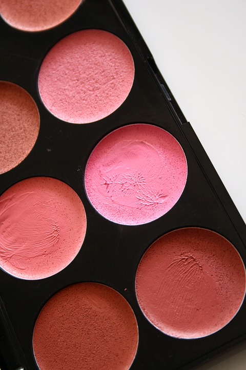 CLose-up of a lipstick palette to indicate cosmetic products.