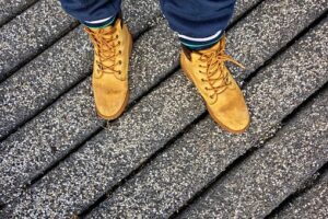 image of a pair of industrial workboots being worn
